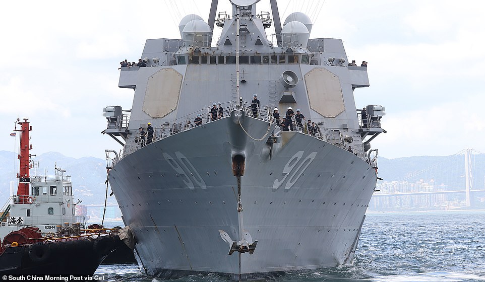 The USS Chafee pictured arriving in Hong Kong. She is an Arleigh Burke'class guided missile destroyer and is part of the Nimitz Carrier Strike Group